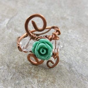 Copper ring with turquoise colored rose